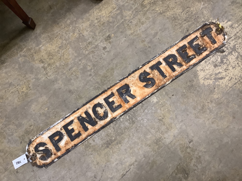 A vintage cast iron street sign for Spencer Street, 98 x 13cm
